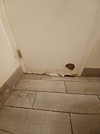 The inside bottom of the bathroom door