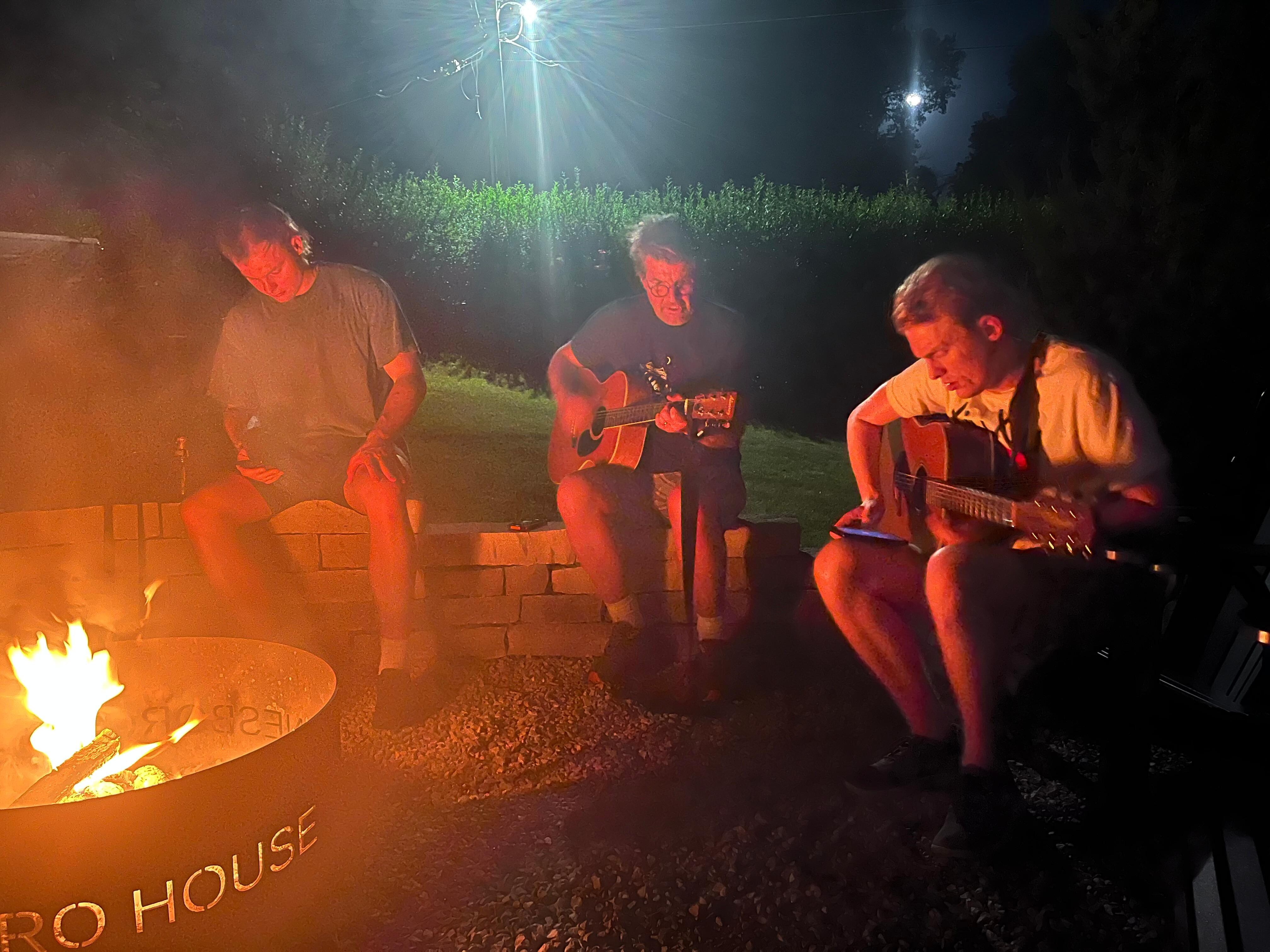 By the fire behind the house
