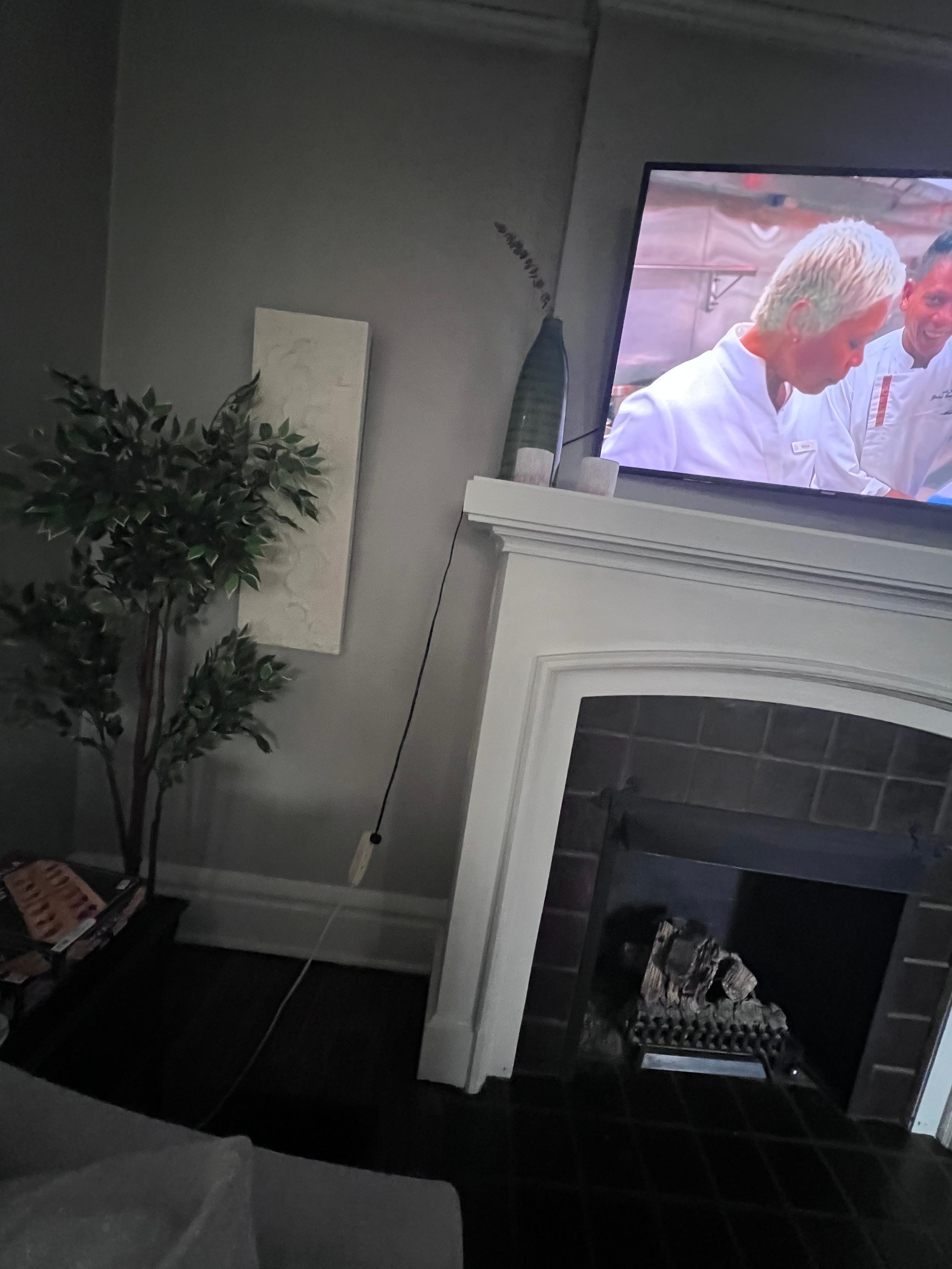 Tv plugged in with extension cord 