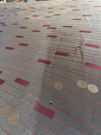 Cigarette burns in blanket