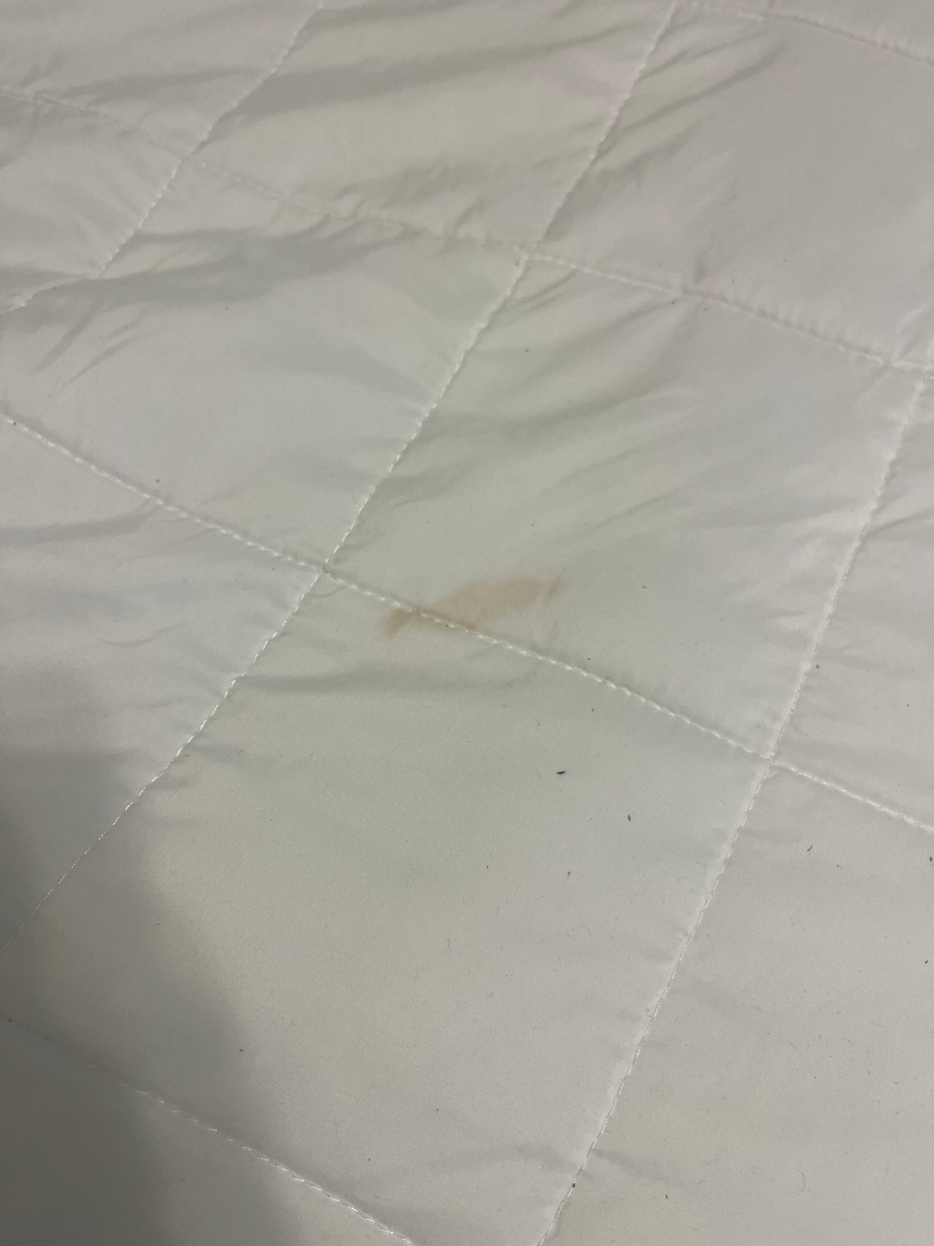 Bedding with stains