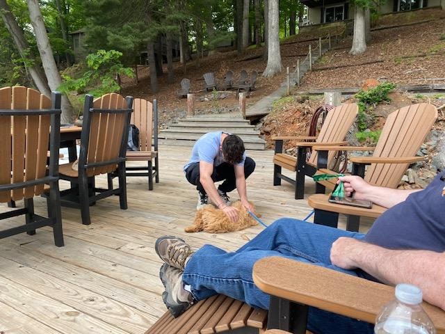 Bob enjoying being petted on the dock at Humble Hideaway,  Smith Mountain Lake.