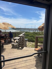 Looking out the back door of the restaurant next to our hotel at the pier