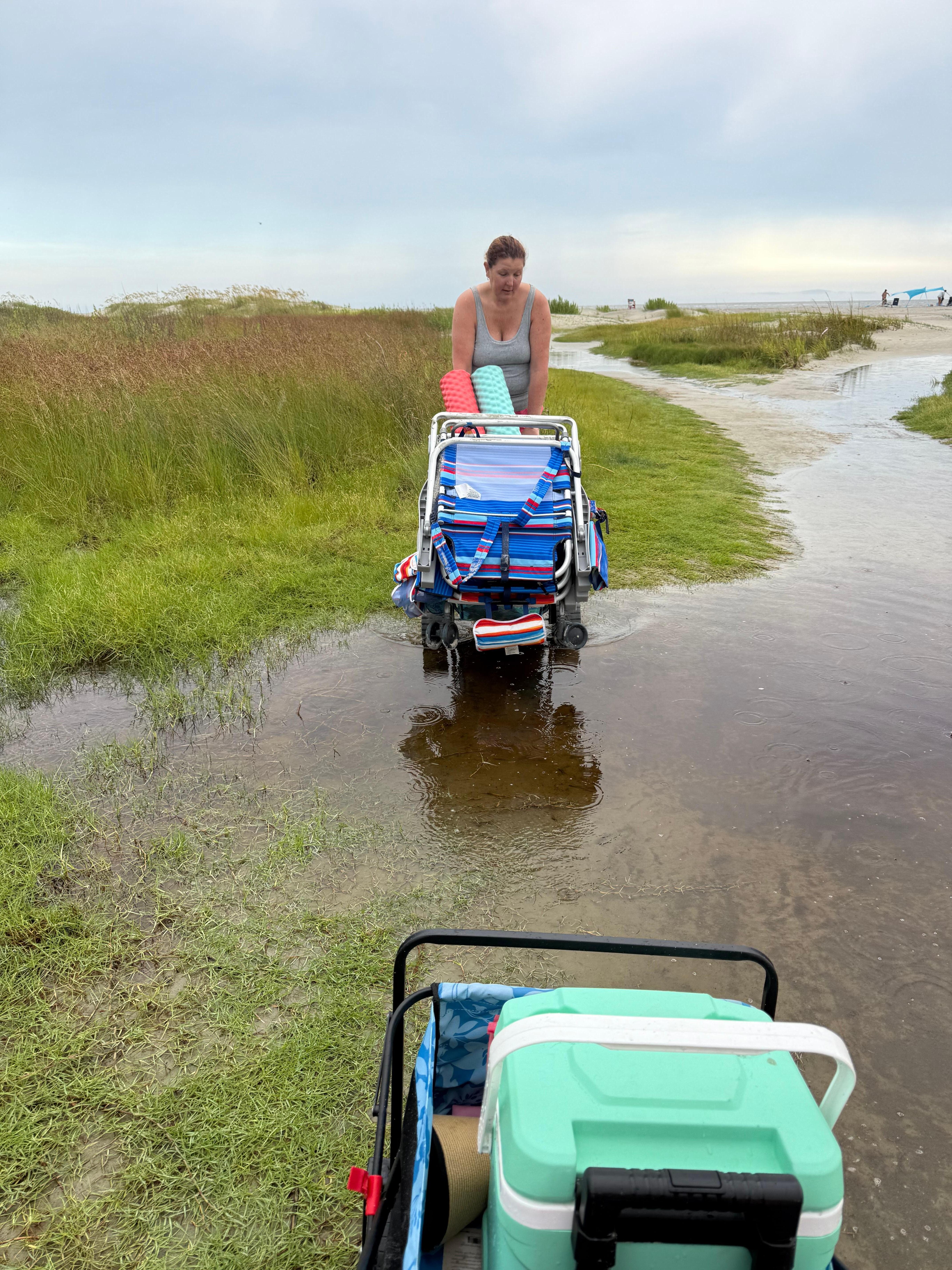 The path to the beach floods after a heavy rain storm.  