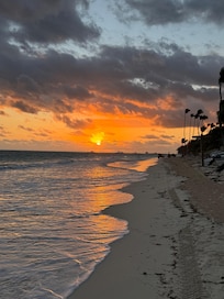 Beach right over the dune from our room. Last day sunrise!