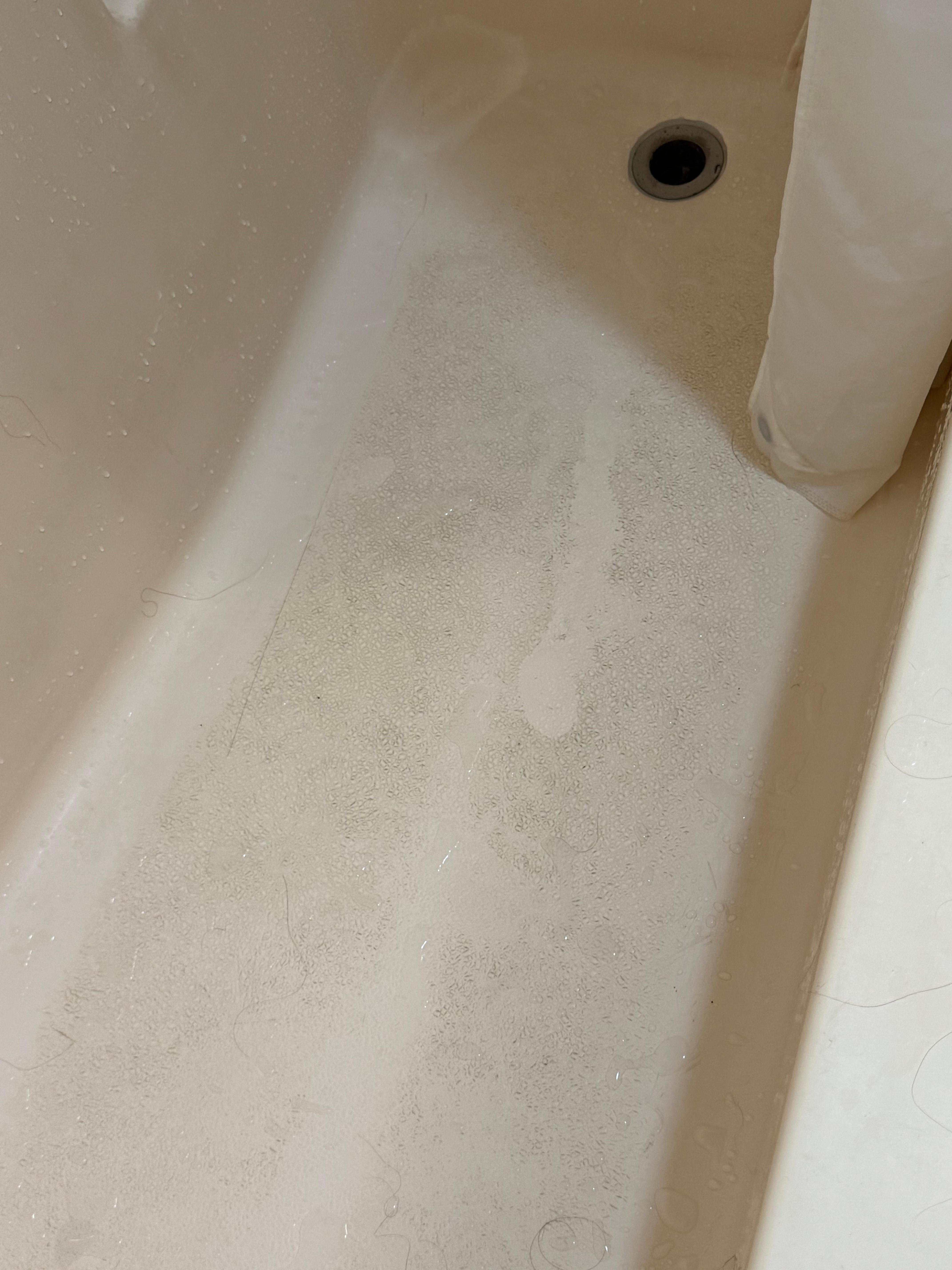 You can see how dirty the bottom of the bathtub is by looking at the spot where the soap sat for a moment — it’s the only clean part of the tub.