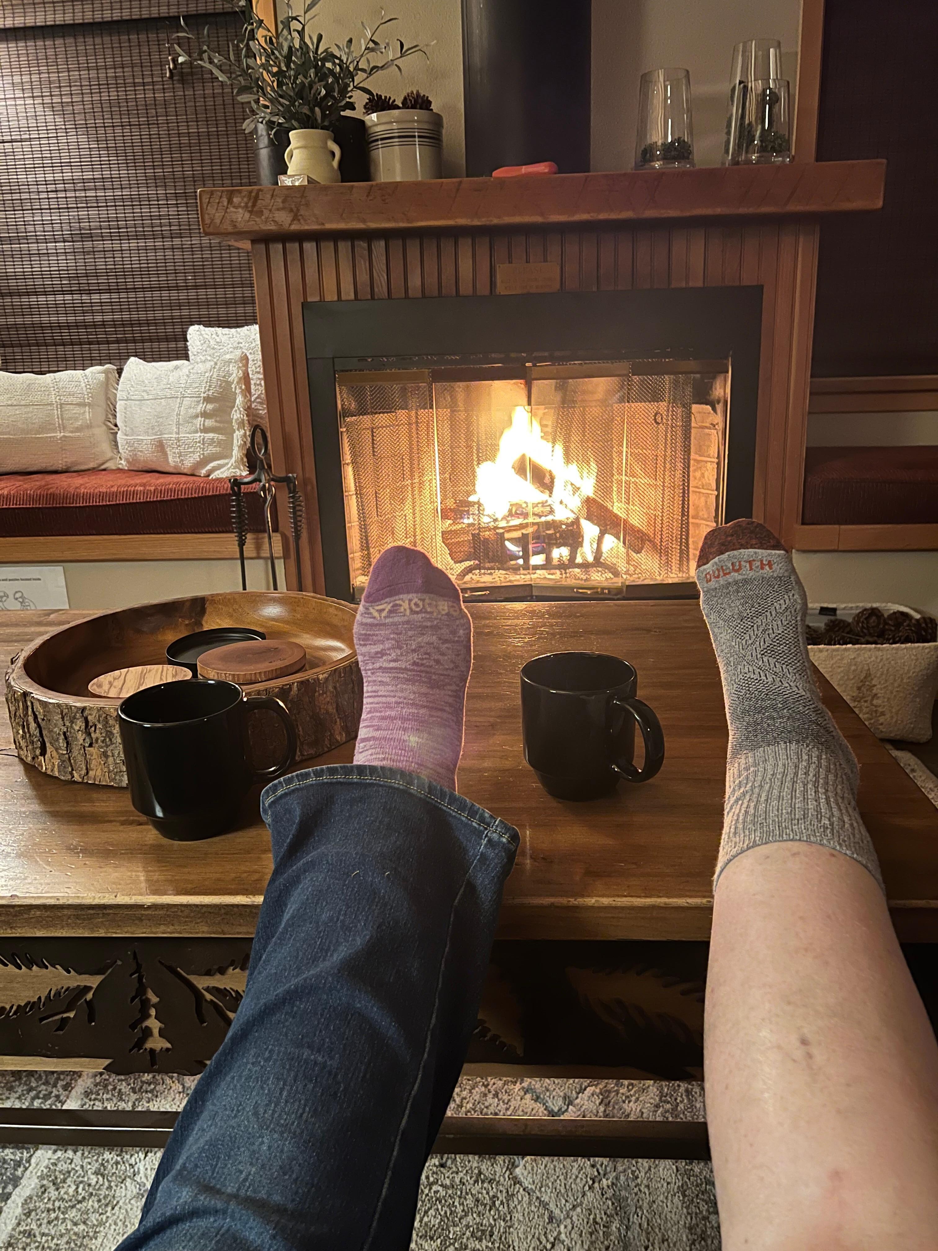 Our feet by the fire