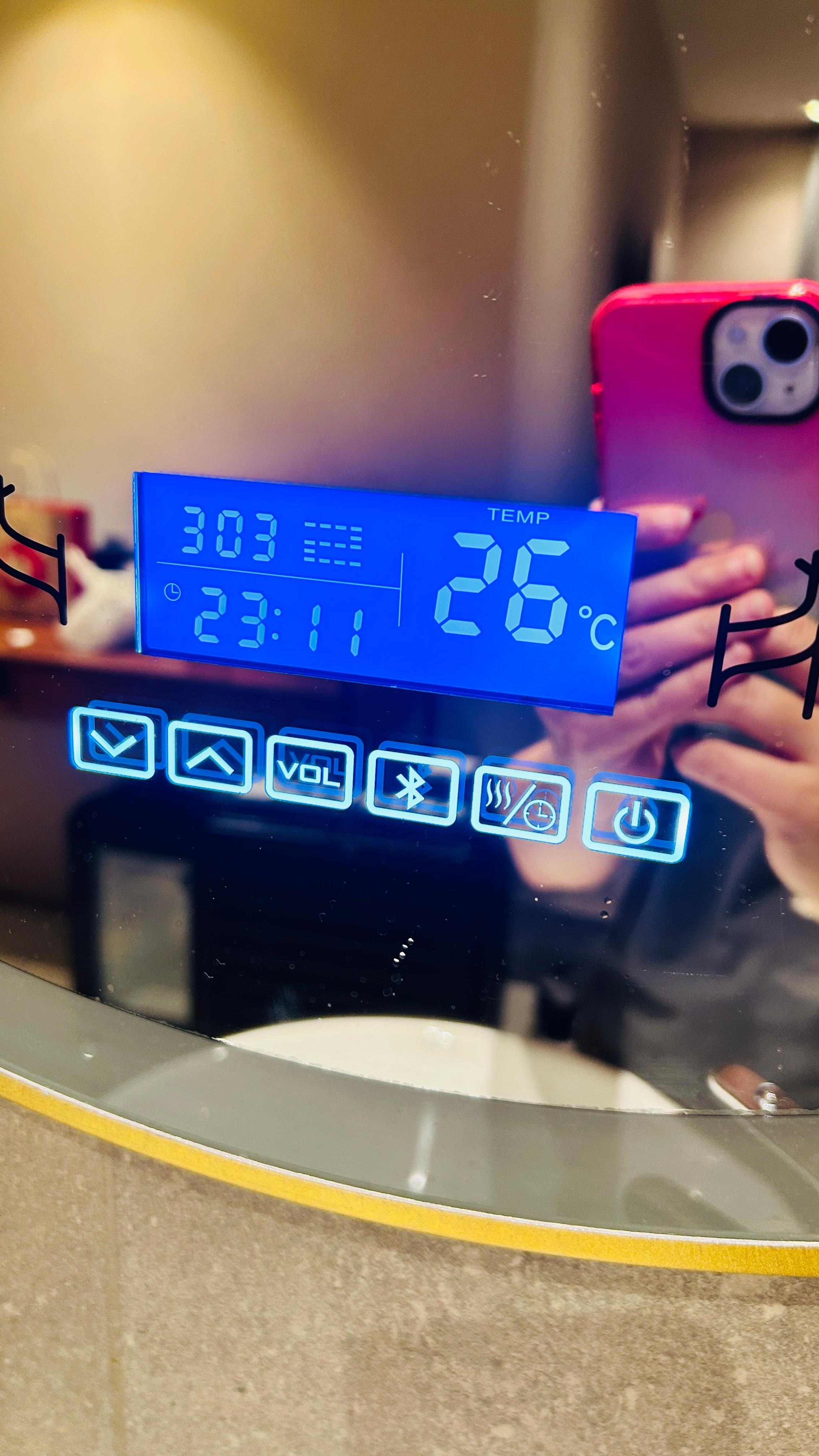 Digital panels with annoying blue light on mirror which cannot be switched off. 