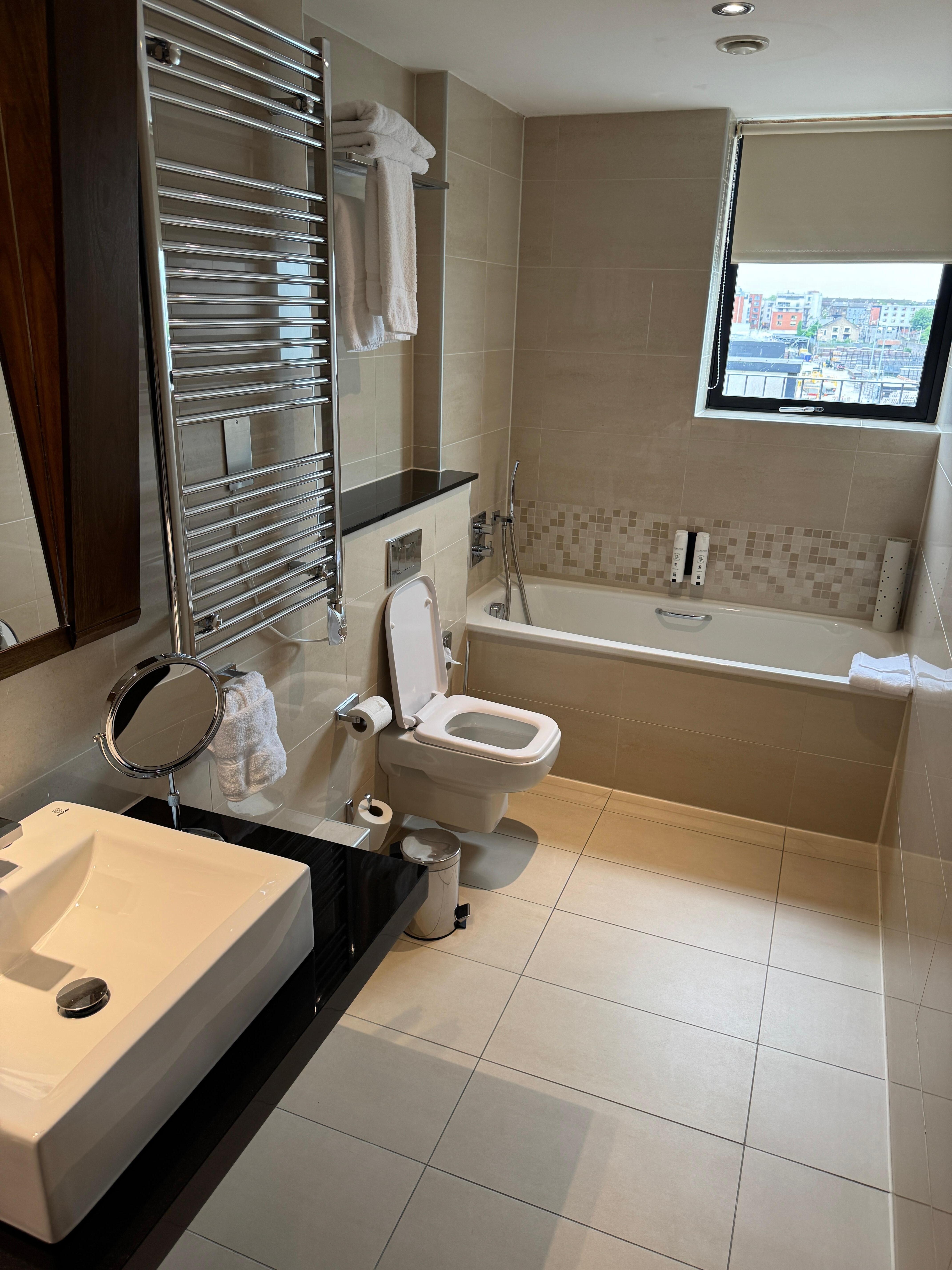 Bathtub section of the bathroom in the Deluxe Room