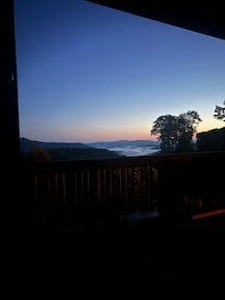 Watching the sunrise in the morning with a nice cup of coffee