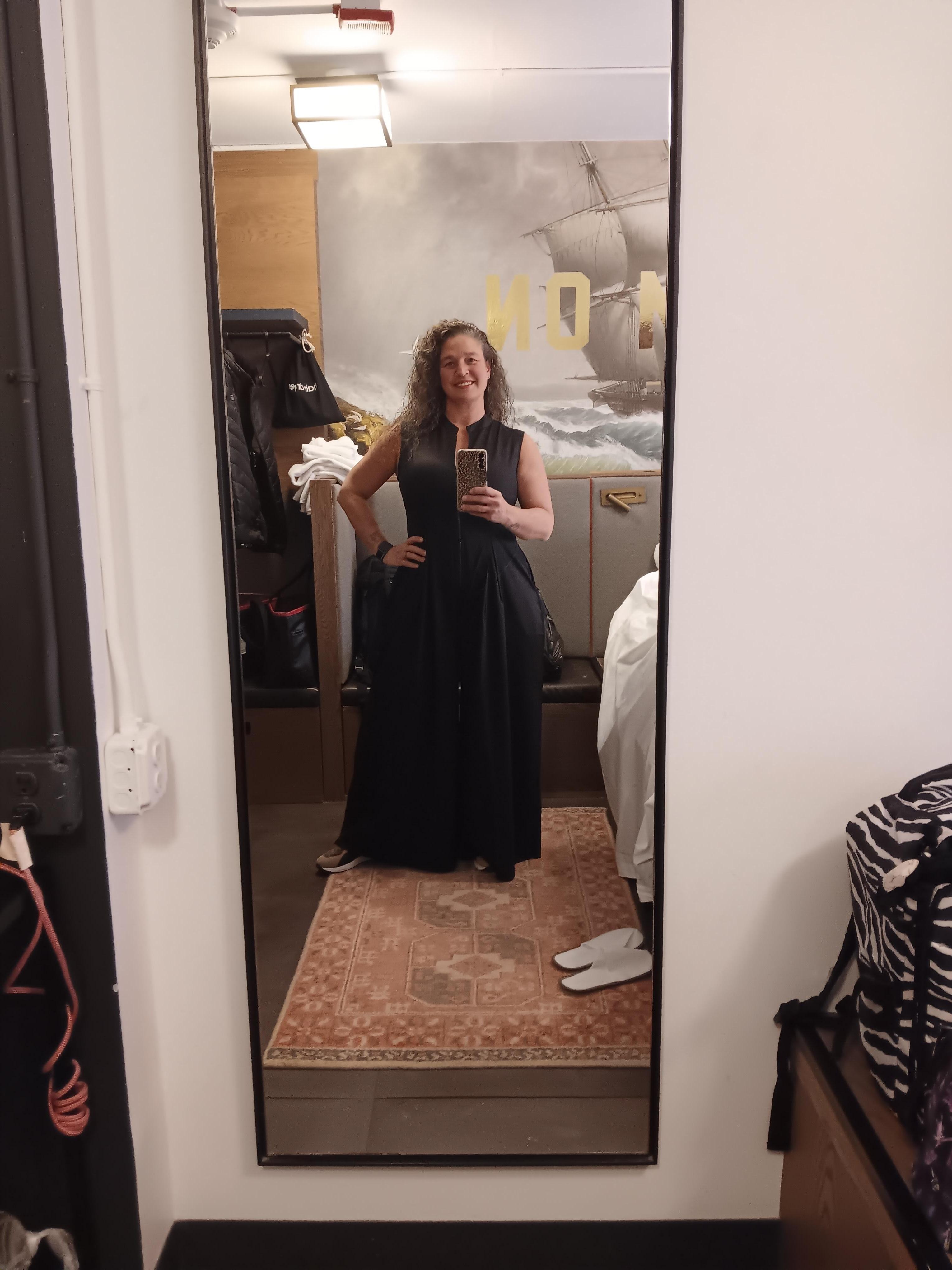 Getting ready for my day of site seeing. My room was amazing and I loved it could open the window and let air in.