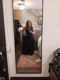 Getting ready for my day of site seeing. My room was amazing and I loved it could open the window and let air in.