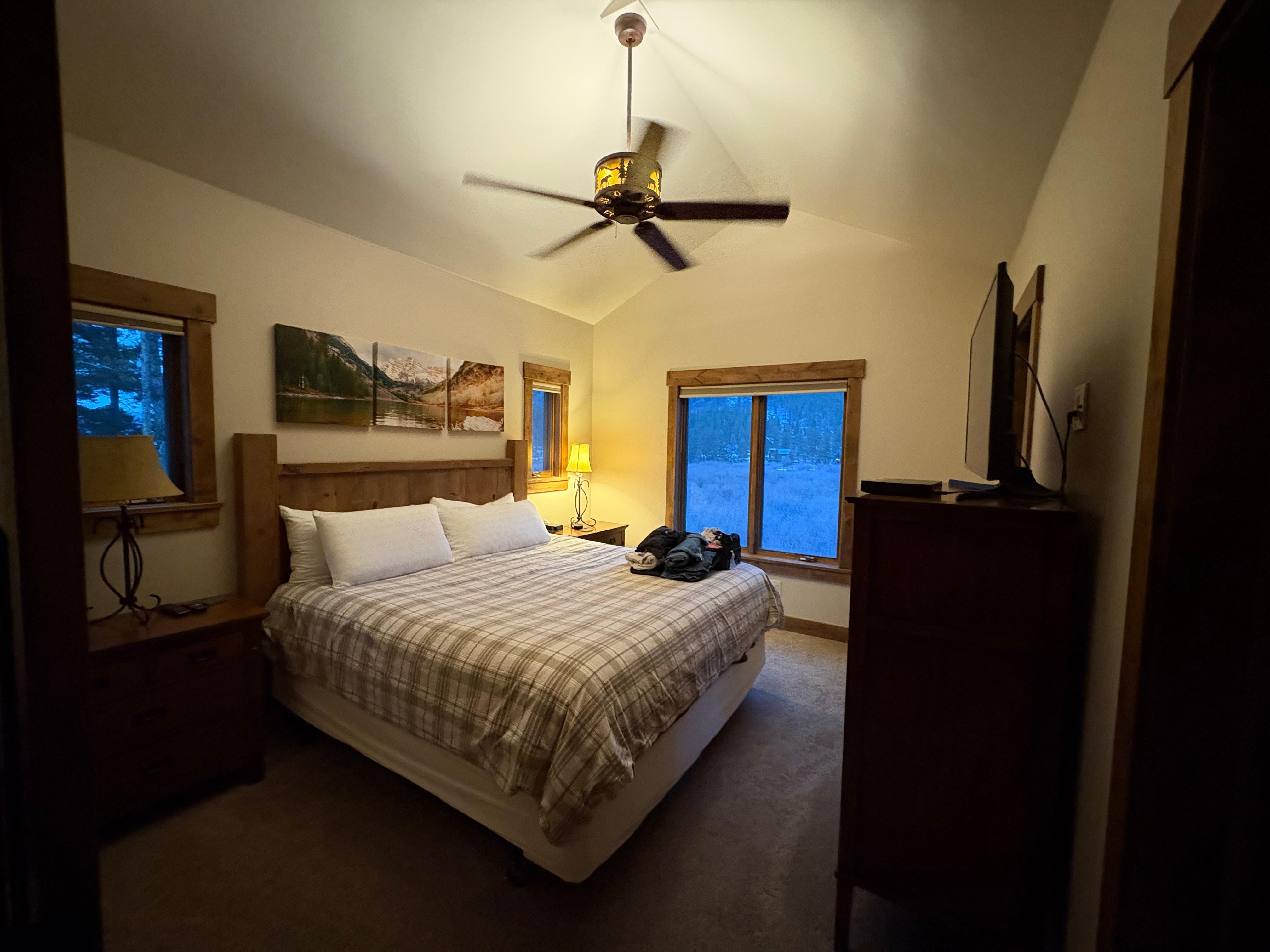 Master bedroom with walk-in closet and spacious bathroom with a beautiful view