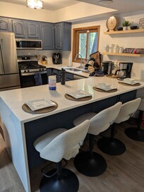 Nice-sized kitchen with breakfast bar.