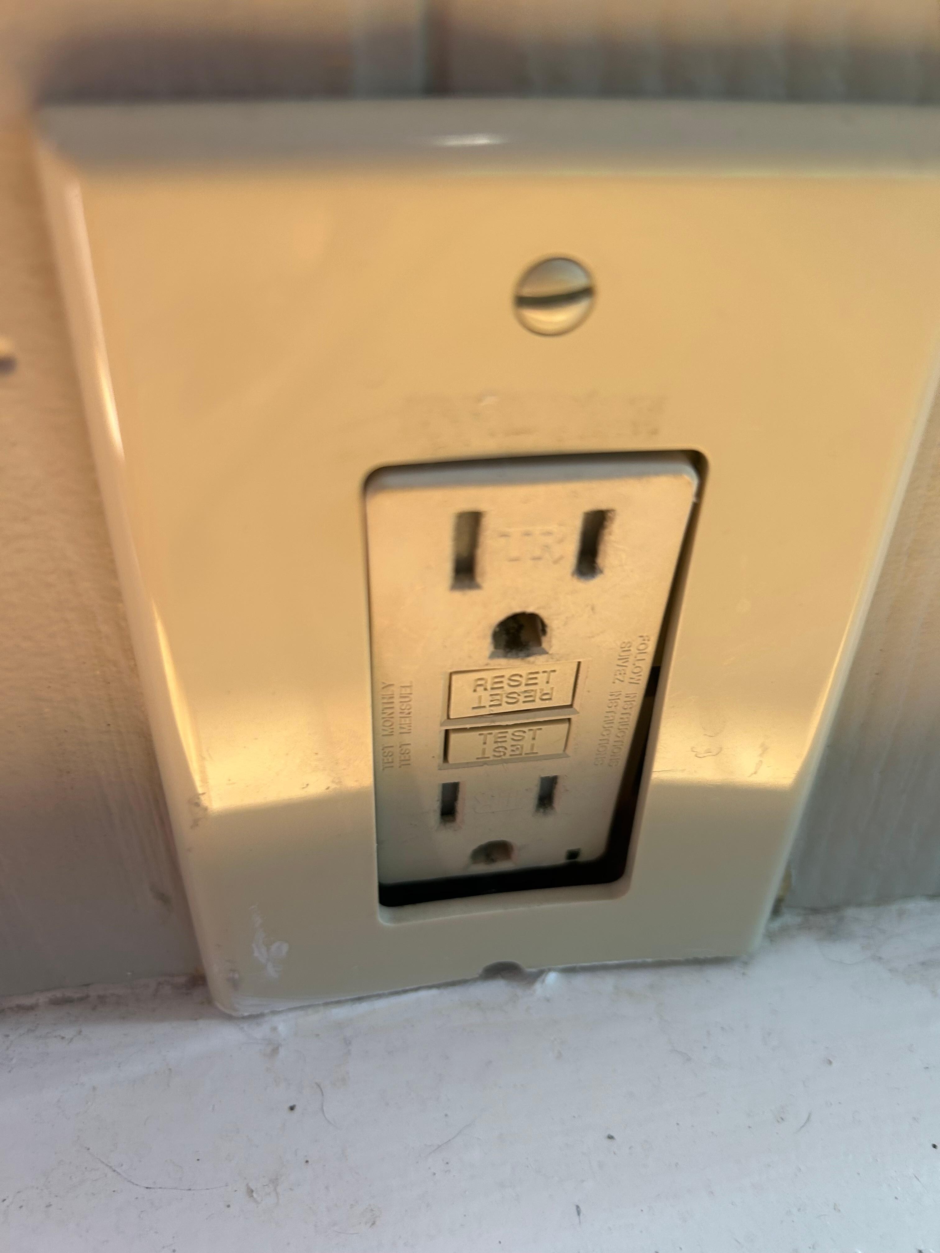 Broken outlet by the air hockey game 