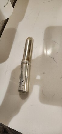 Broken toilet paper holder