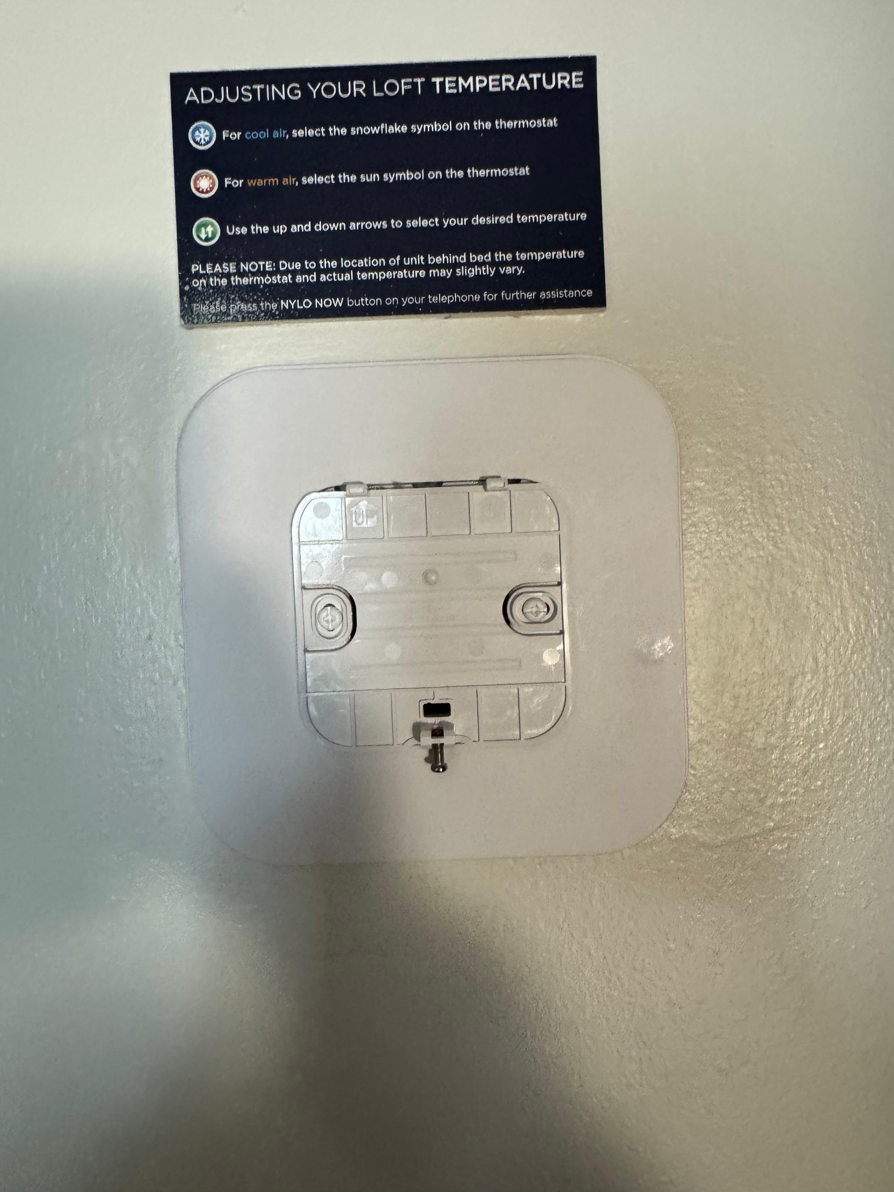 This is a photo of the place on the wall where the thermostat should have been. The desk guy had no idea there were not thermostats in the room. Gave some statement about maintenance guy or manager said it was not wired. Really a very poor answer. 