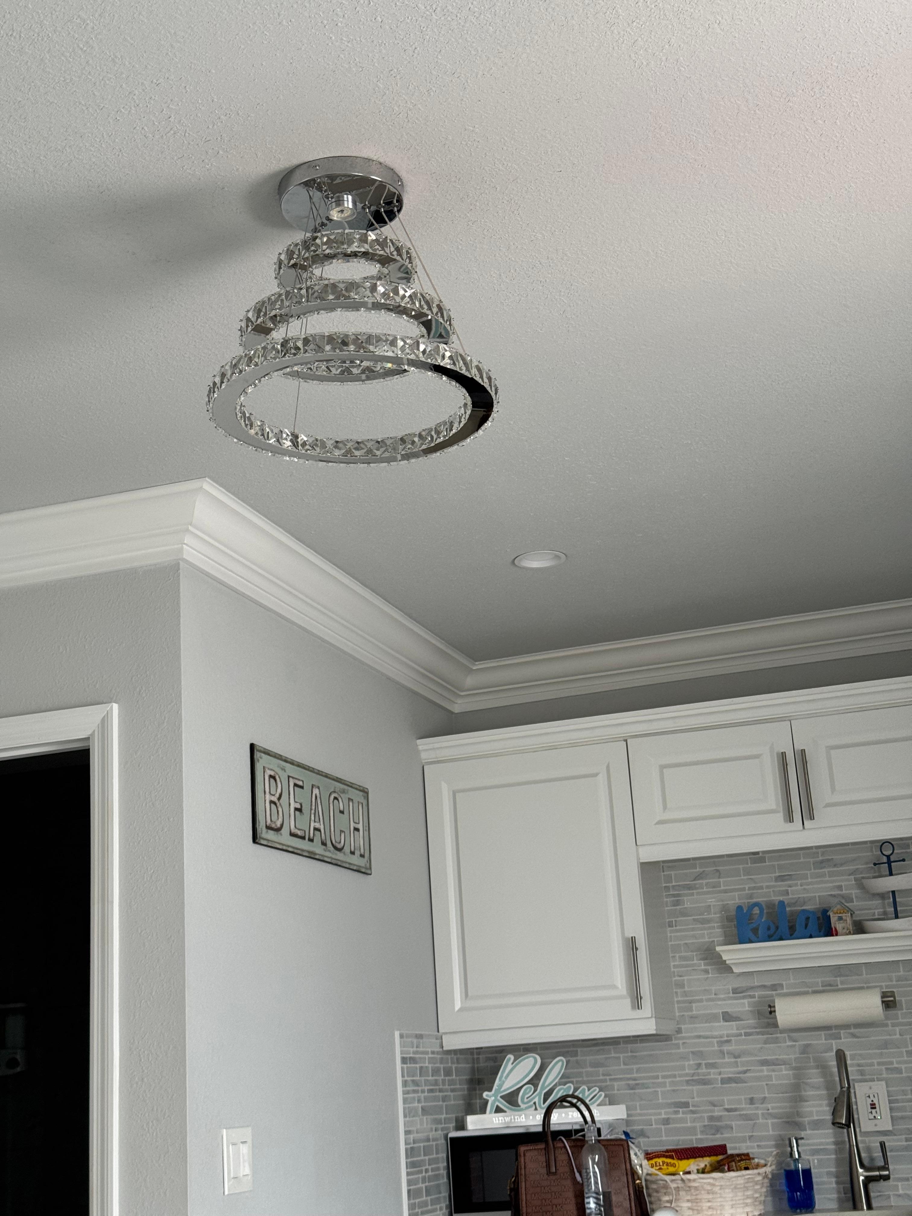 Chandelier in room.