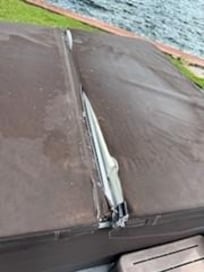 The hot tub cover was filthy, covered with mold, and literally falling apart.