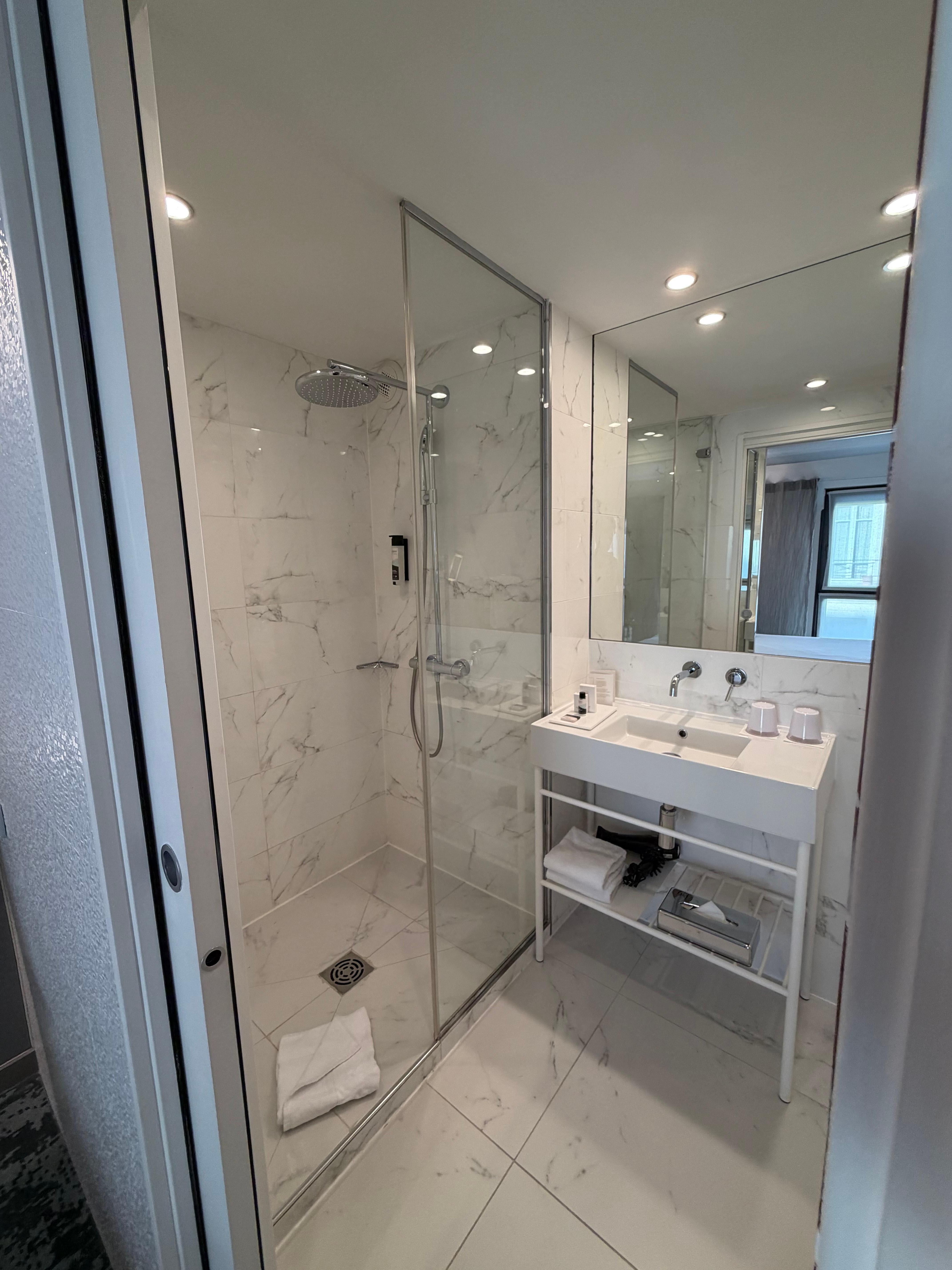 Shower and sink (toilet in a separate room)