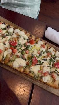 The mid margherita flat bread.