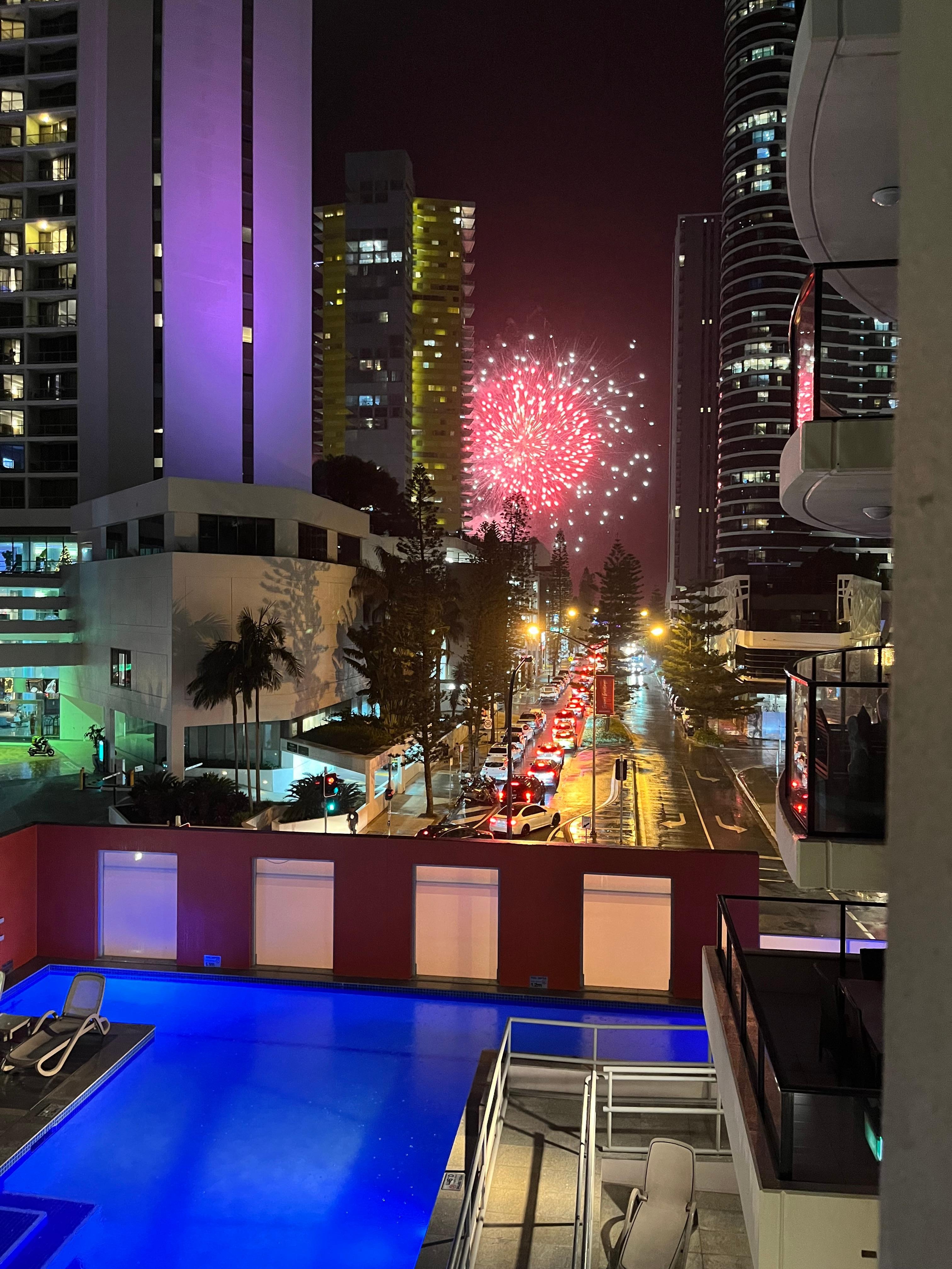 The pool lit up by New Year’s Eve fireworks 