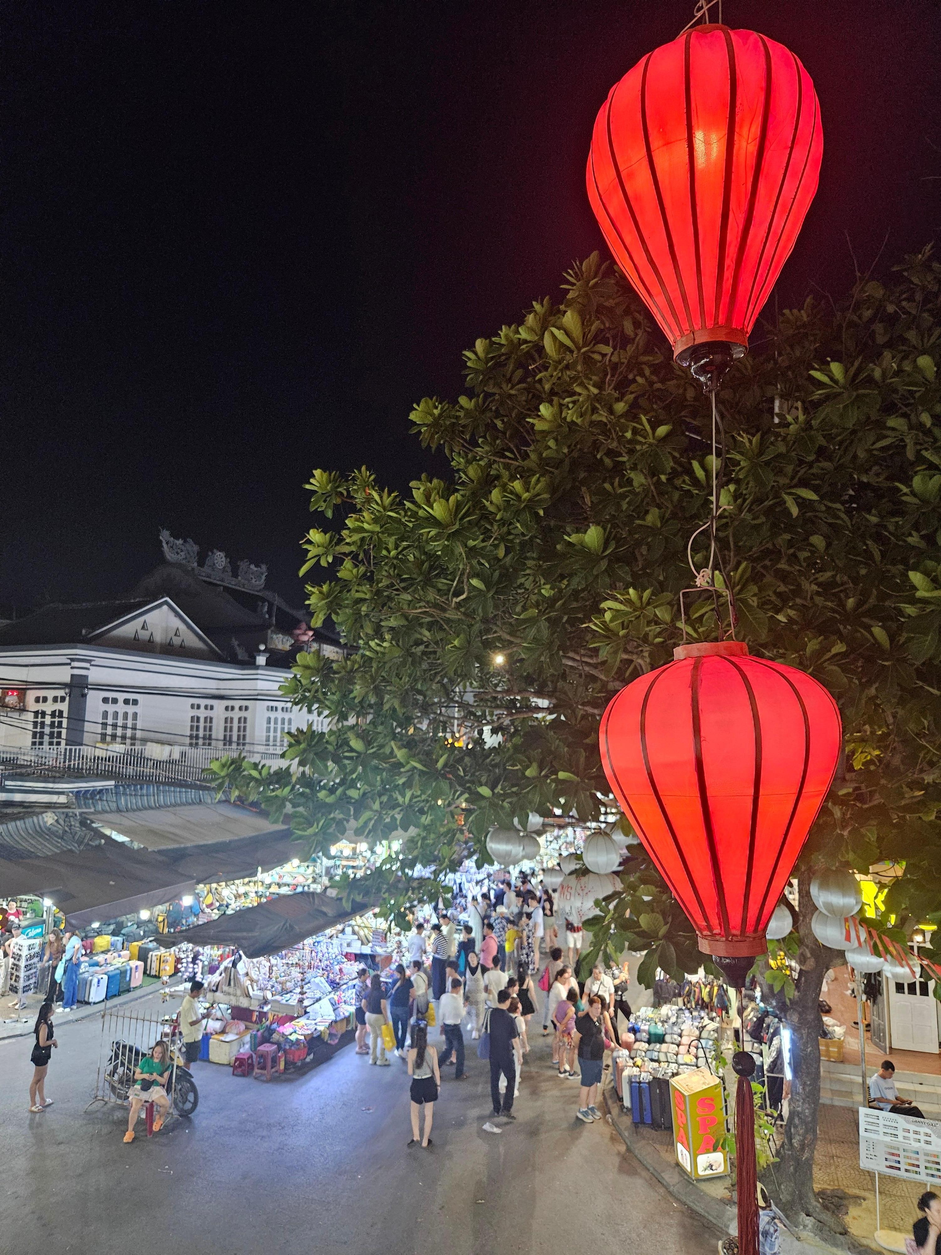 View of night market from hotel balcony 