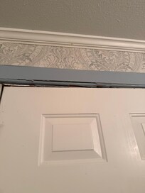 Door rot / rusted and wasp nests in the door jams .