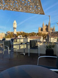 Roof terrace in the morning at end October.