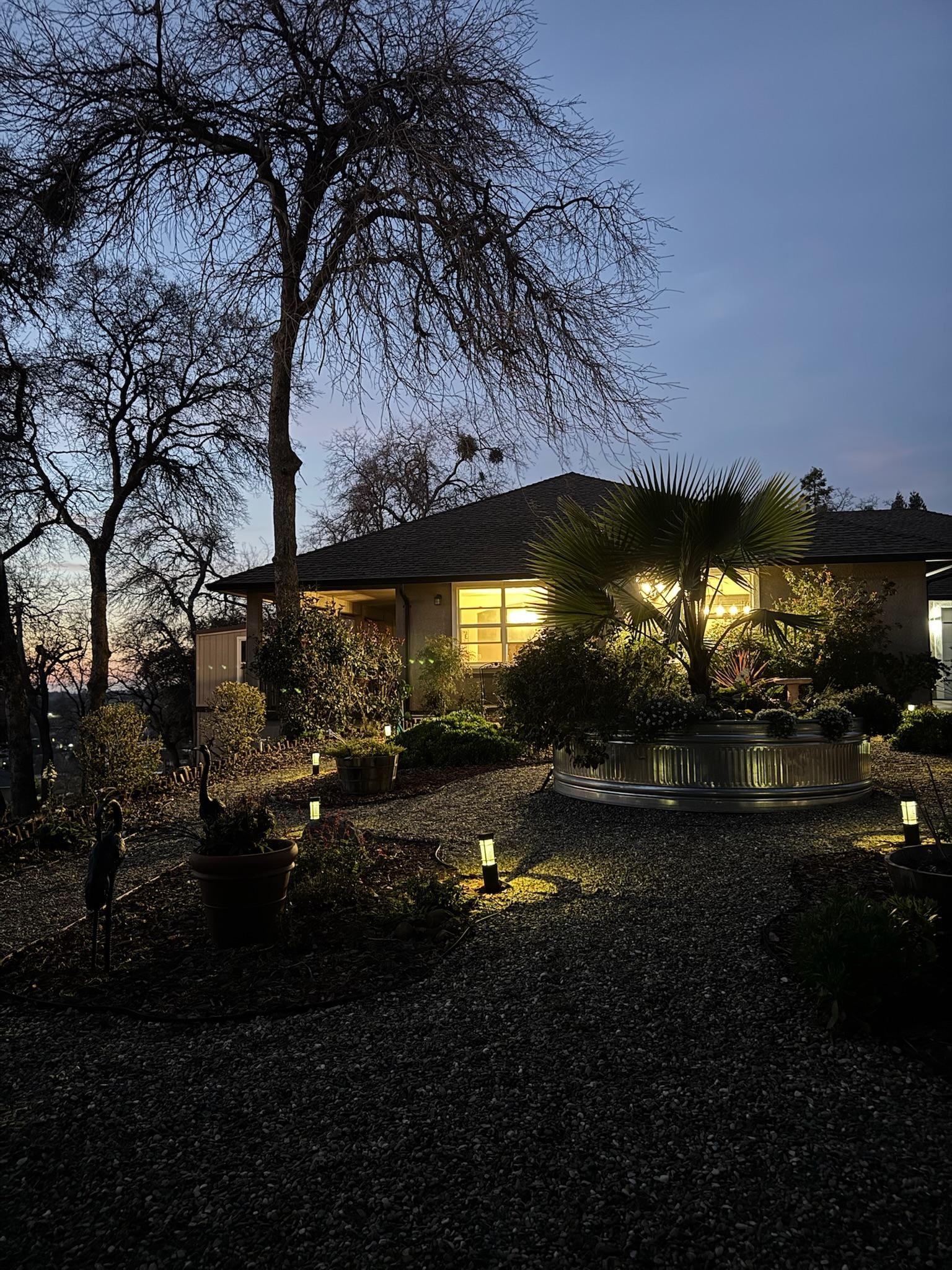 Exterior grounds and house at dusk