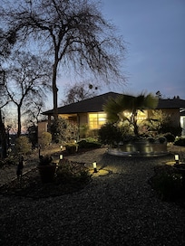 Exterior grounds and house at dusk