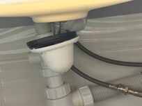Sink pipe disconnect. (We reattached it ourselves.)