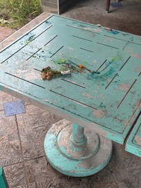 Patio tables and chairs. Do not sick down on them, the paint will rub off and stain your clothing