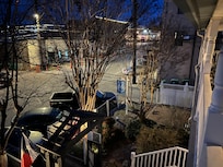 Enjoying all the sights and sounds of downtown from the comfort of the upstairs porch.