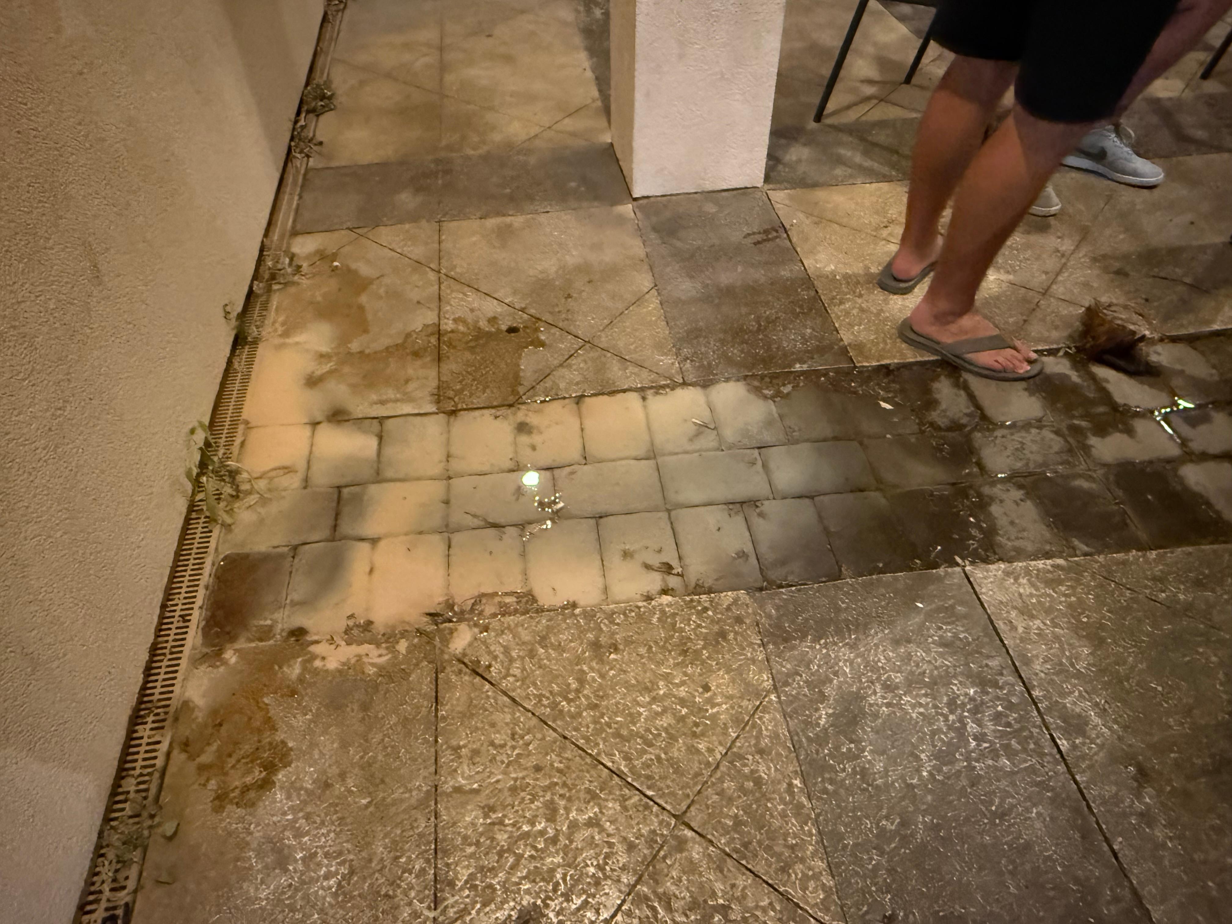 Active bubbling leak out of patio. 