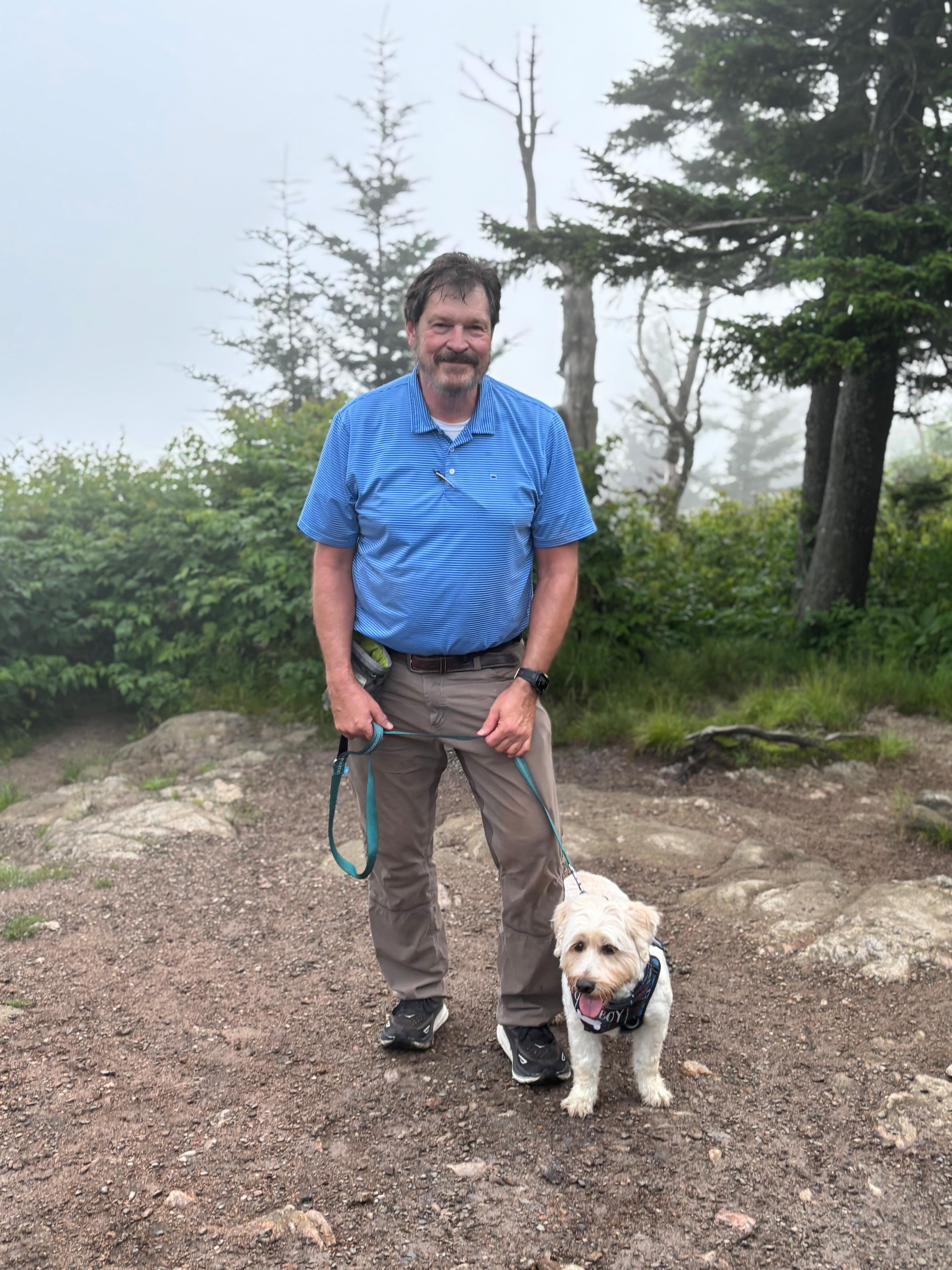 My husband and Mack at the top of Waterrock Knob. 