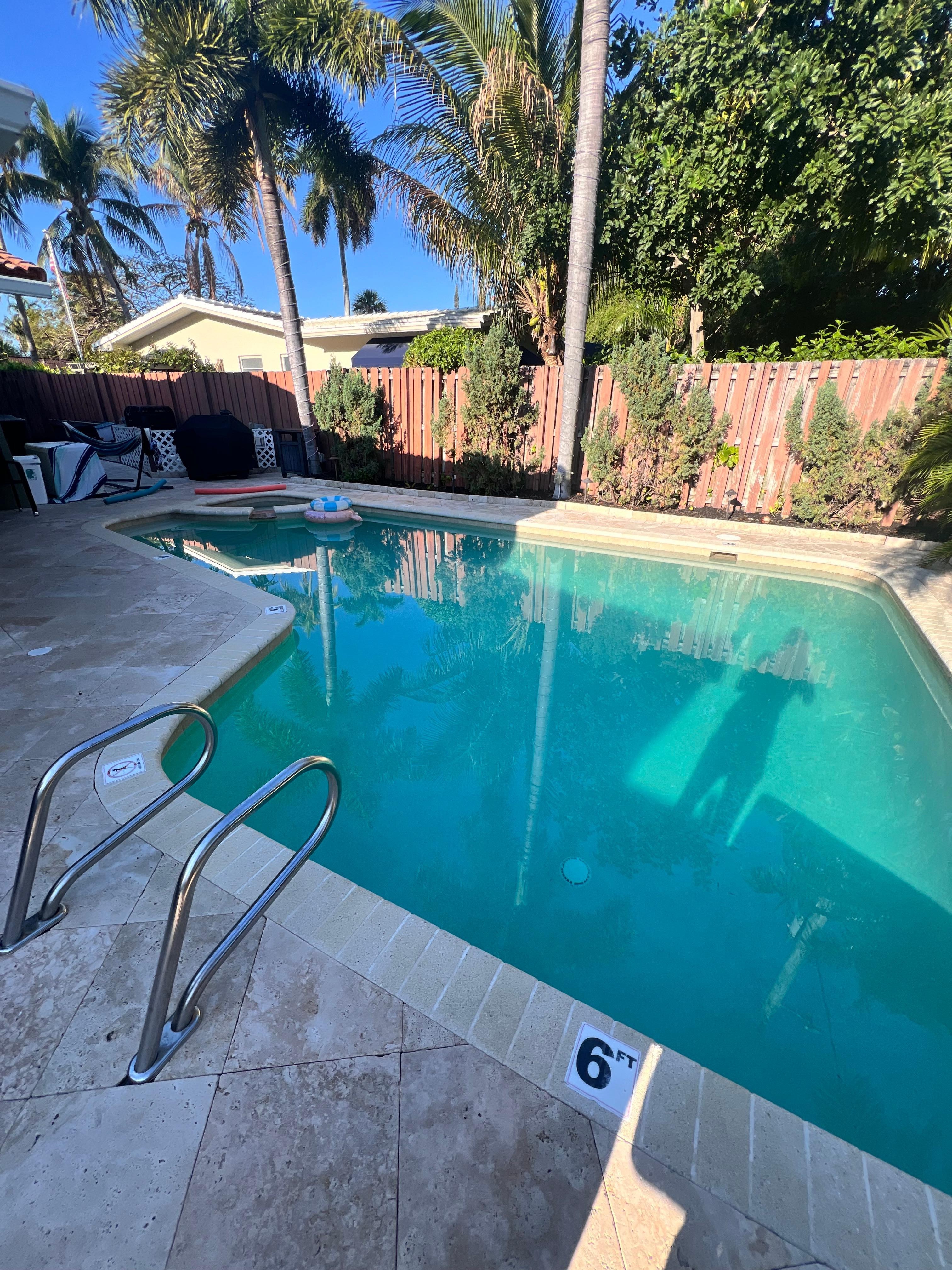 Beautiful large pool with hot tub. 