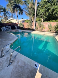Beautiful large pool with hot tub.