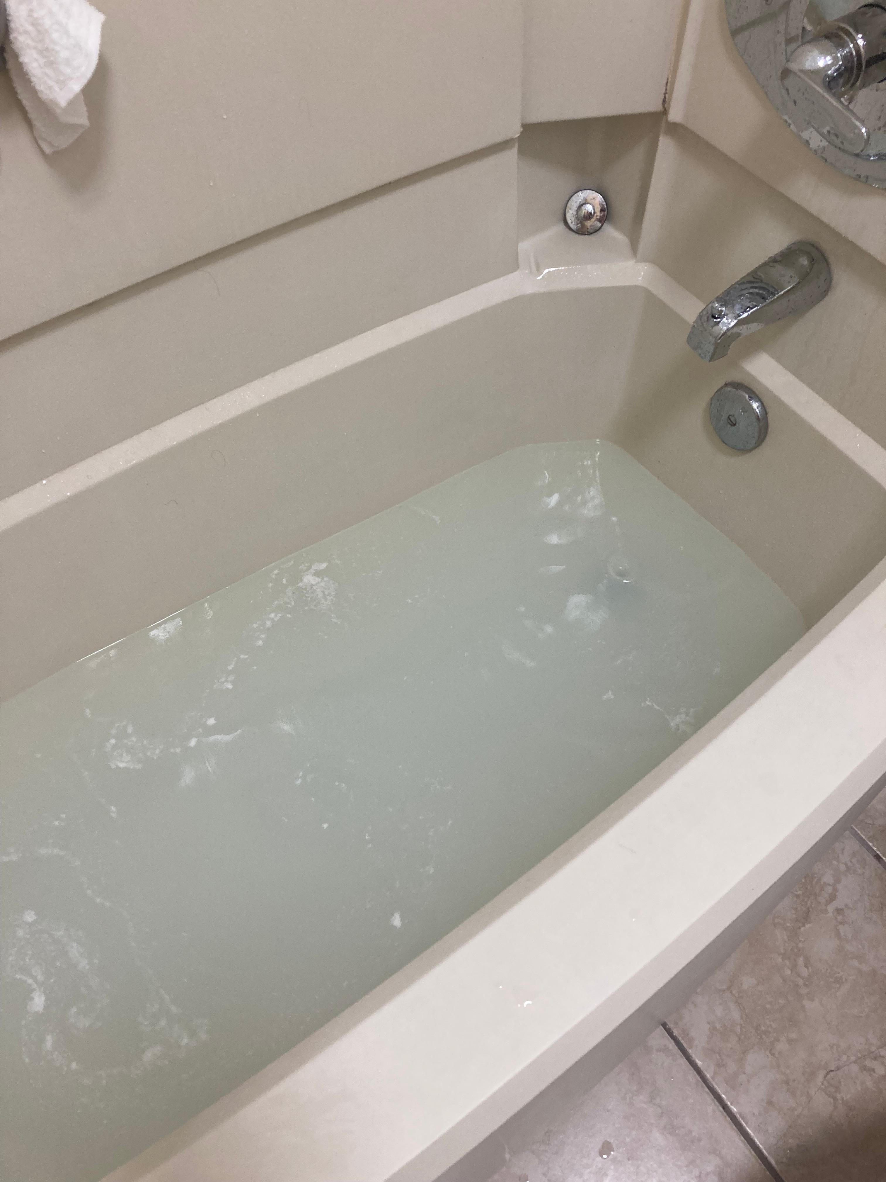 Bathtub water that never drained after taking a shower, probably 4” deep. 