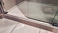 Dirty shower floor.