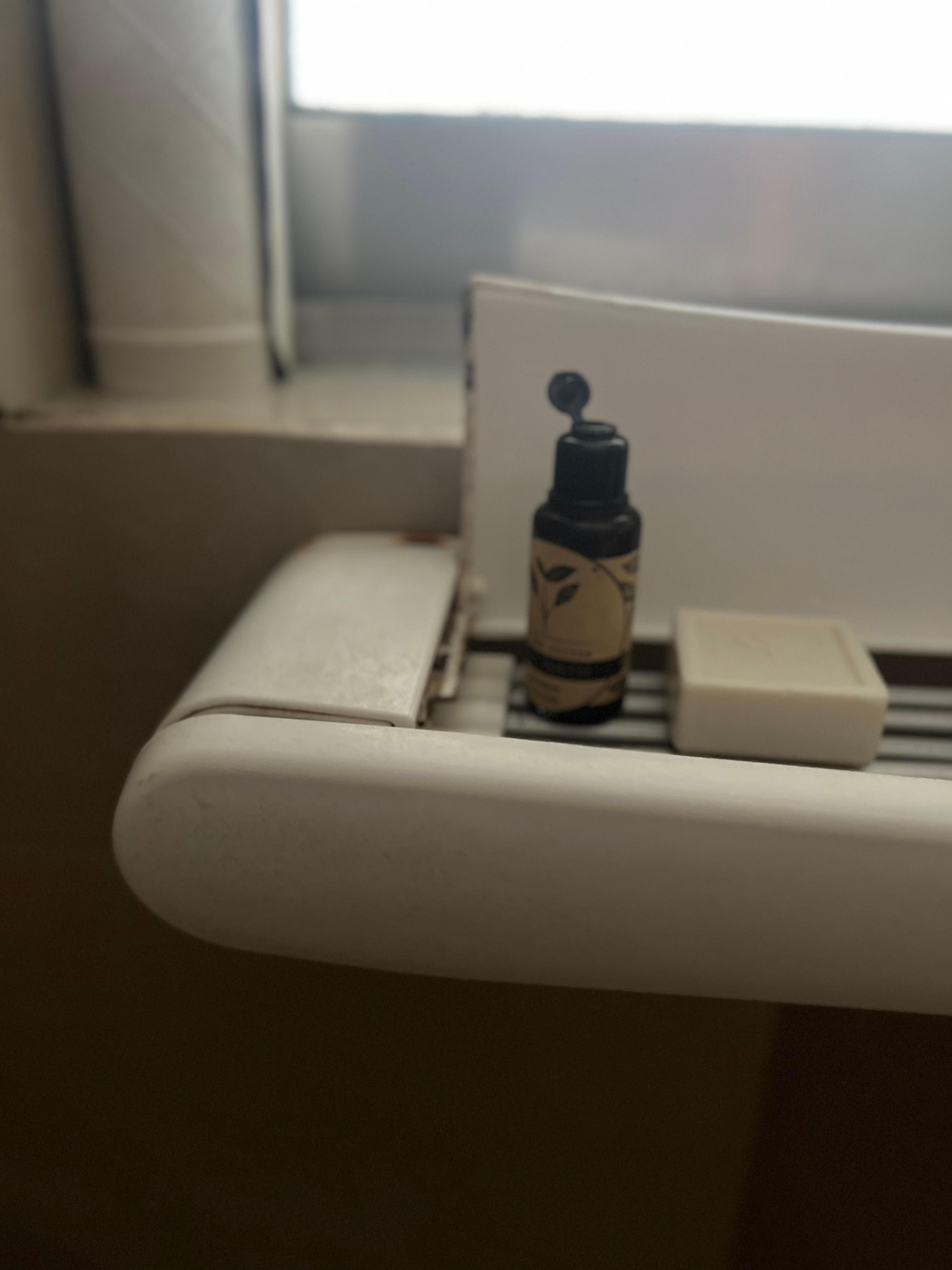 Moldy clothes rack in shower