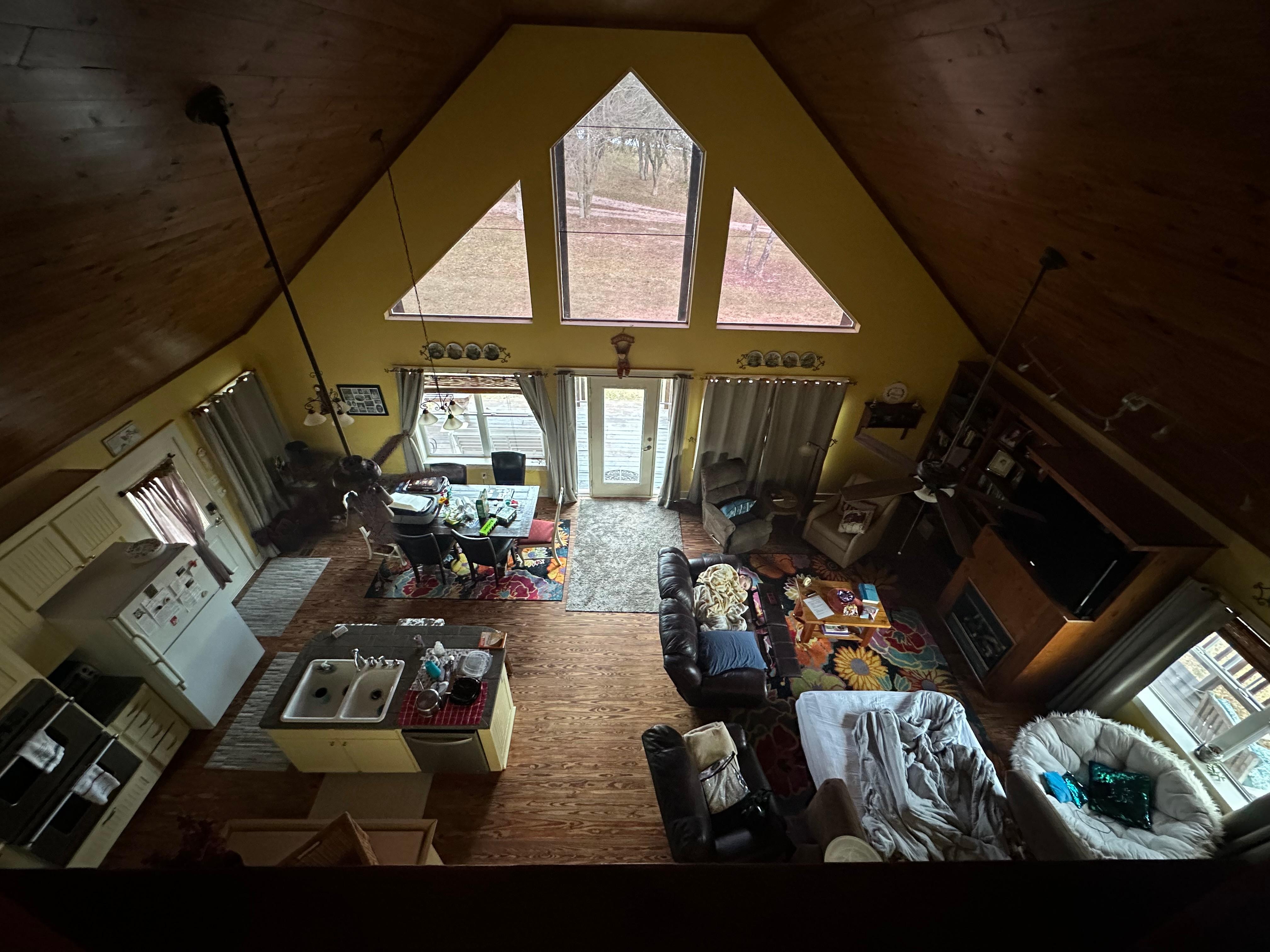 The kid on the couch chose to sleep there, rather than a bed