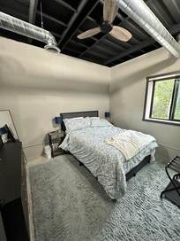 The smaller of the 3 bedrooms on the lower level
