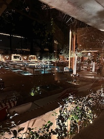 The pool and entrance at night
