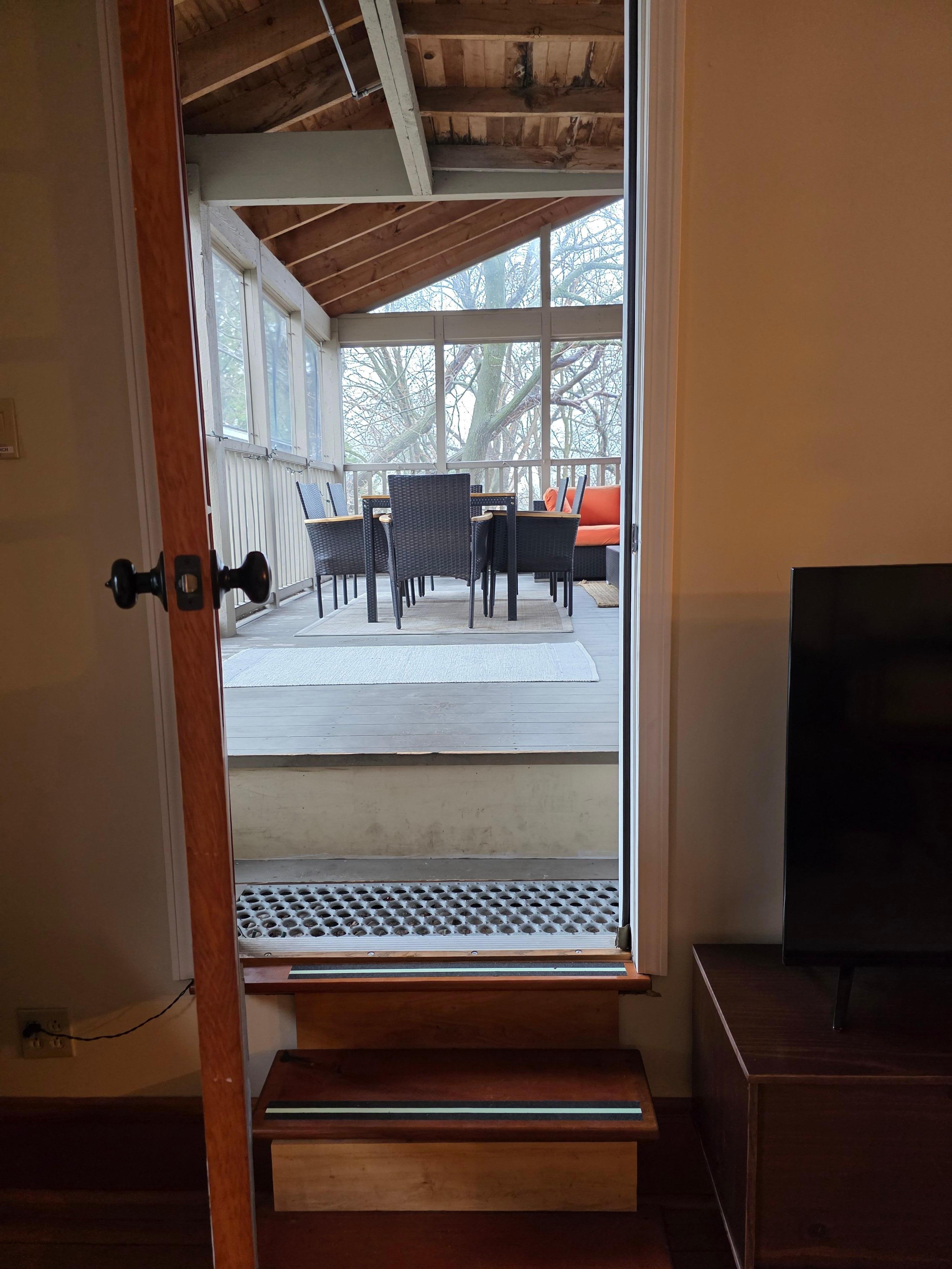 View out the door to the screened in section. 