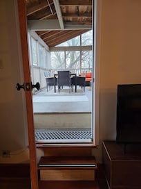 View out the door to the screened in section.