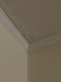 Ceiling is literally falling down in the room.