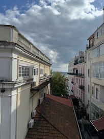 View straight out the window. There was a small wooden table with chairs on the balcony.