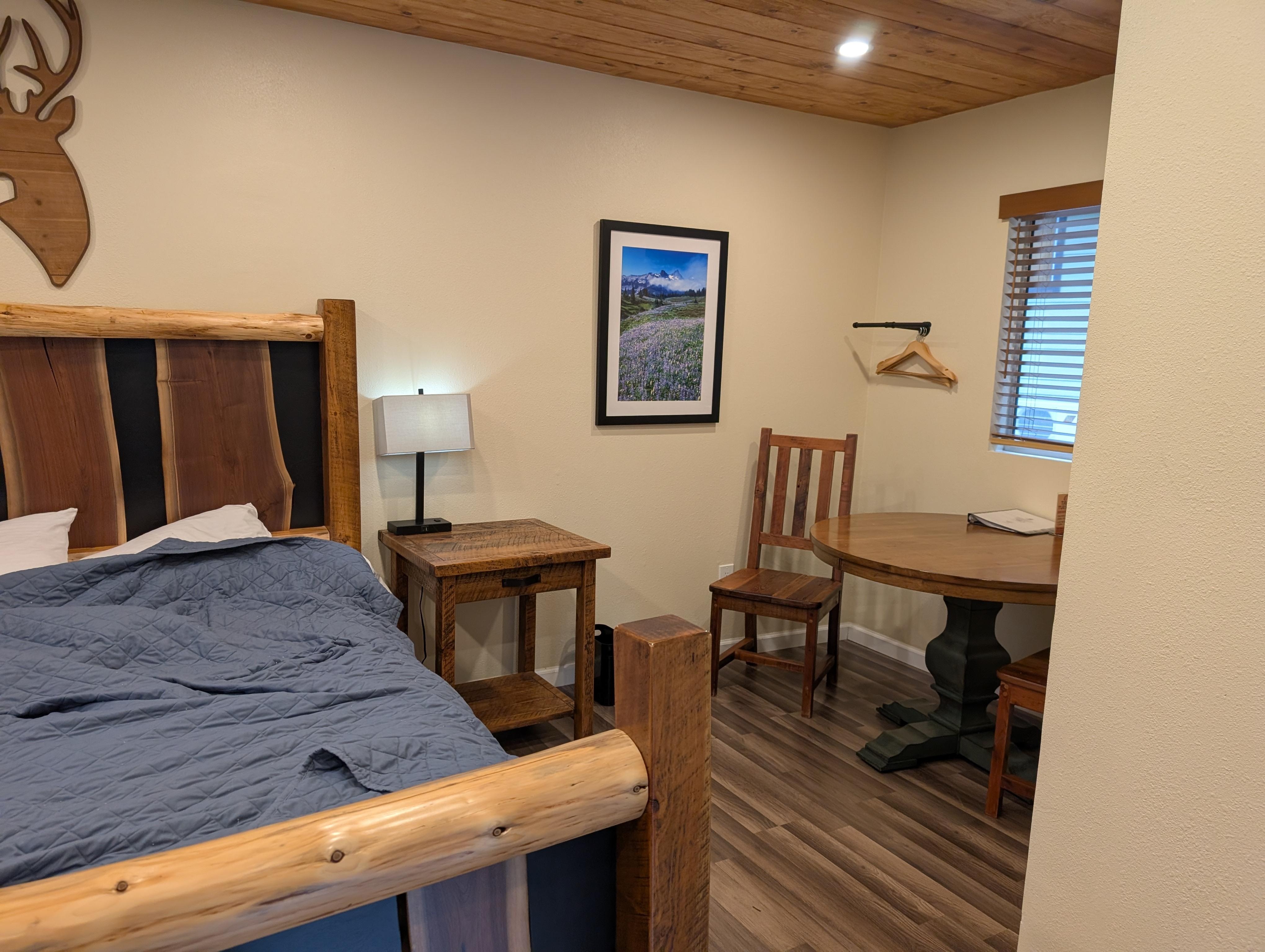 Look closely in the corner is the pole to hang clothes. And the bed has a gap that the pillows fall into while you try to sleep 