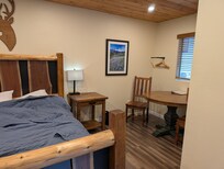 Look closely in the corner is the pole to hang clothes. And the bed has a gap that the pillows fall into while you try to sleep